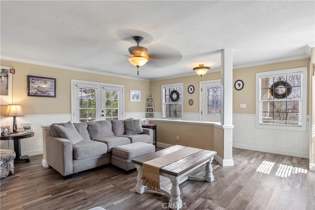 28841 Delaware Drive Tehachapi, CA 93561 - Photo 4 of 36 a living room with furniture and a wooden floor