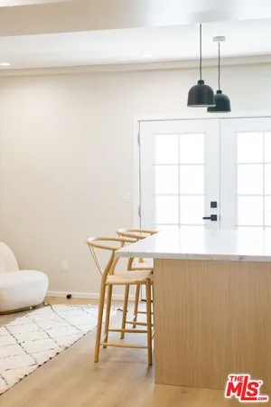 a bathroom with a sink and a window