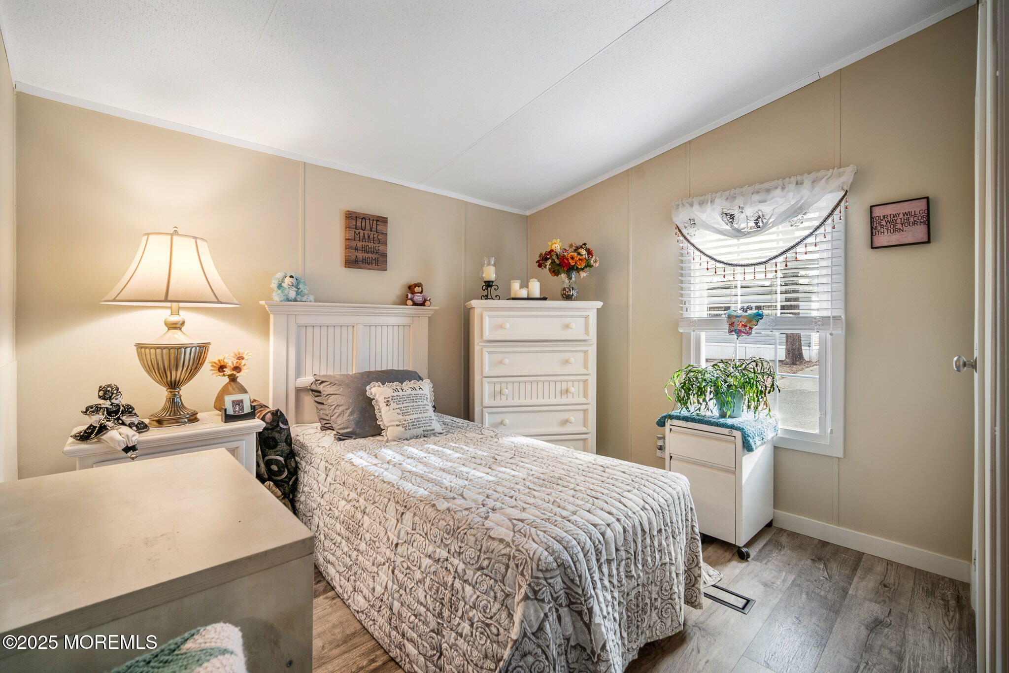 4 Oak Tree Lane Manahawkin, NJ 08050 - Photo 11 of 16 a bedroom with a bed and a window