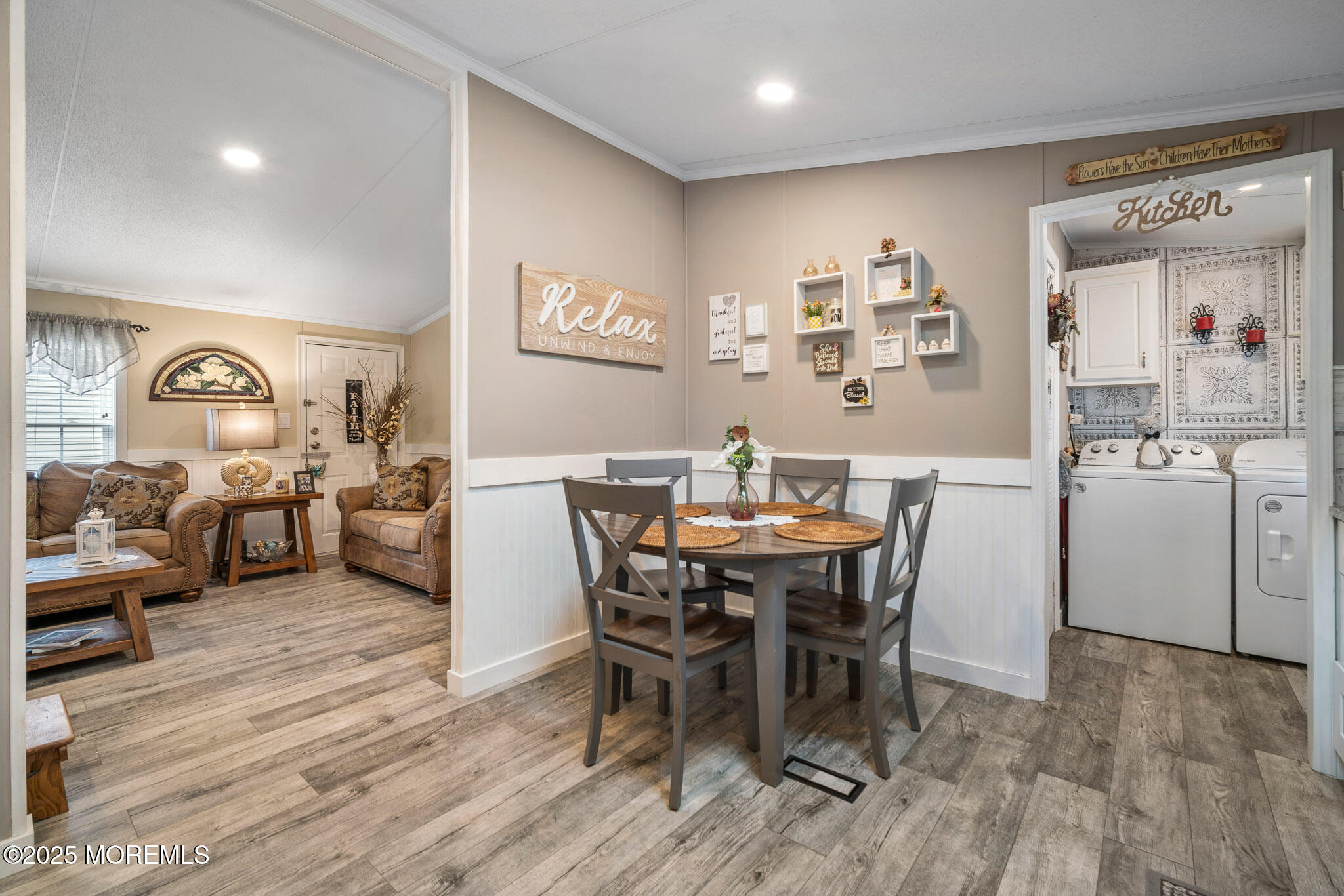 4 Oak Tree Lane Manahawkin, NJ 08050 - Photo 3 of 16 a view of a dining room with furniture and wooden floor