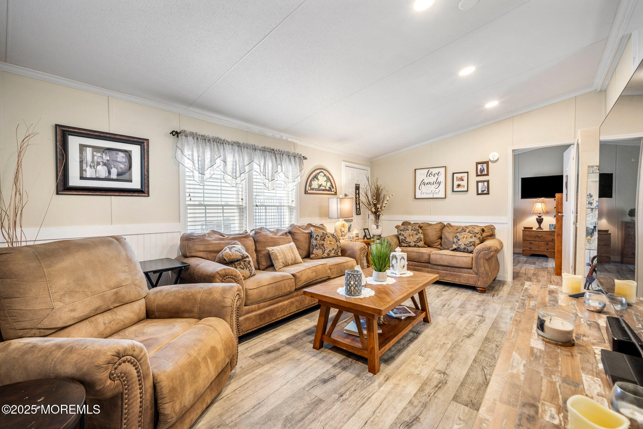 4 Oak Tree Lane Manahawkin, NJ 08050 - Photo 7 of 16 a living room with furniture and a table