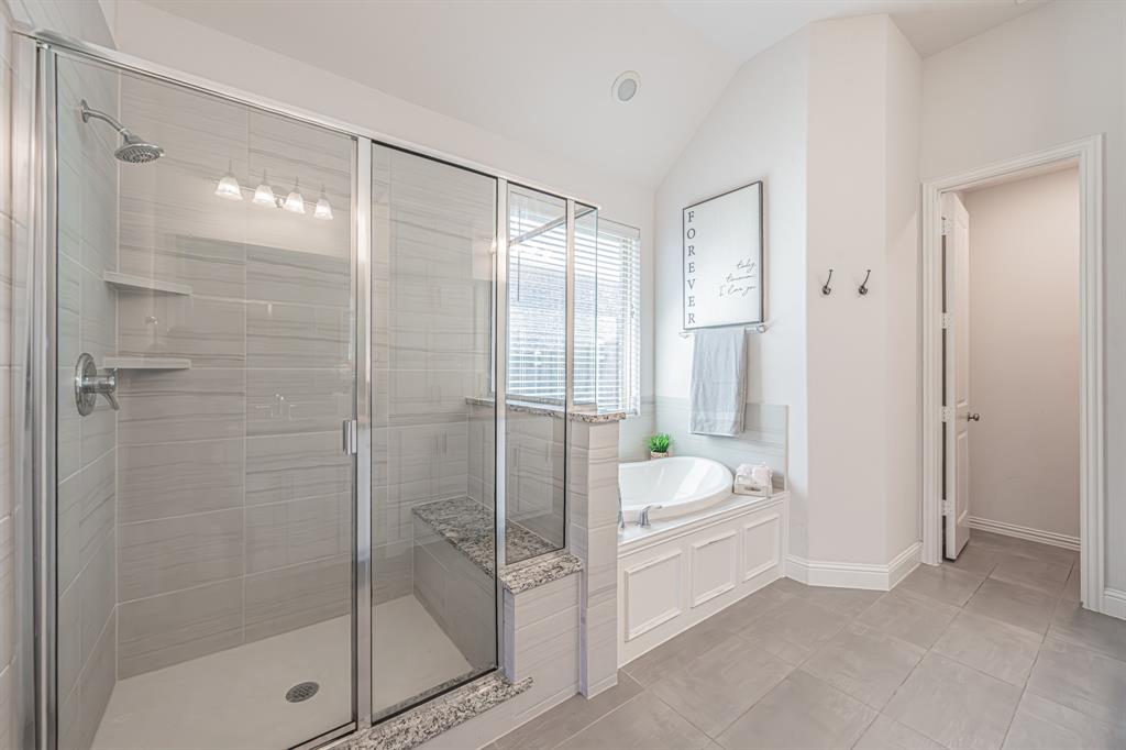 1610 Gardenia Street Prosper, TX 75078 - Photo 21 of 36 a bathroom with a sink vanity tub and shower
