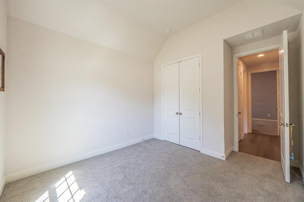 1610 Gardenia Street Prosper, TX 75078 - Photo 25 of 36 a view of an empty room and closet in a room