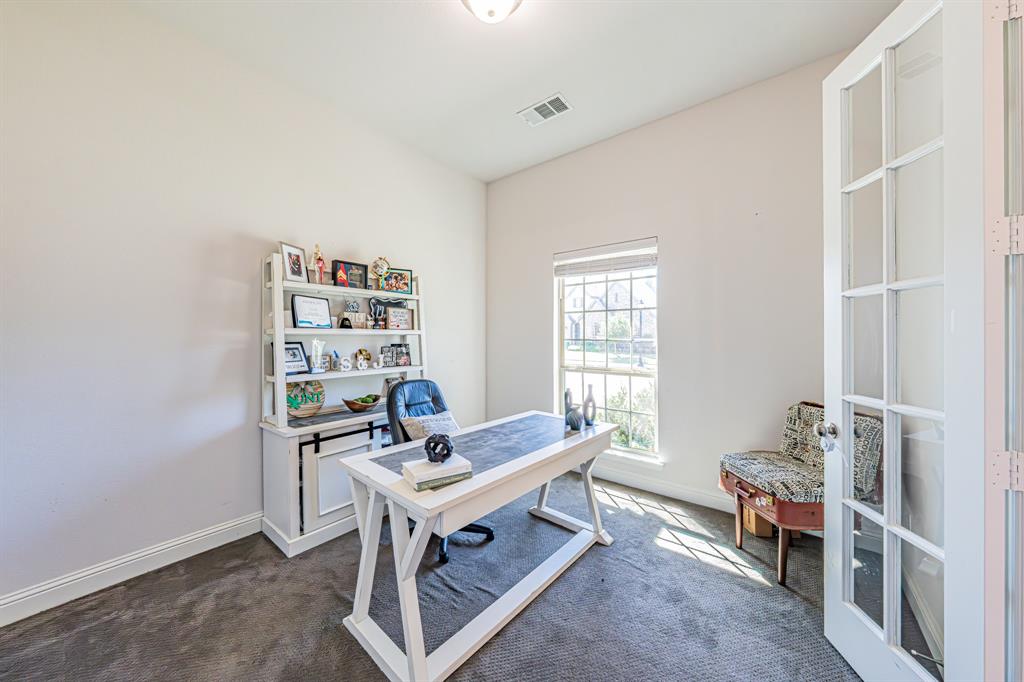 1610 Gardenia Street Prosper, TX 75078 - Photo 4 of 36 a room with furniture a rug and a window