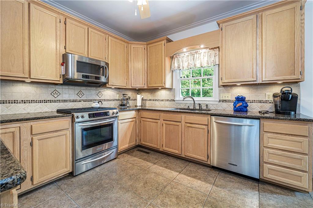 1946 Winding Ridge Road Winston-Salem, NC 27127 - Photo 16 of 45 KitchenAid Appliances including a Gas Range