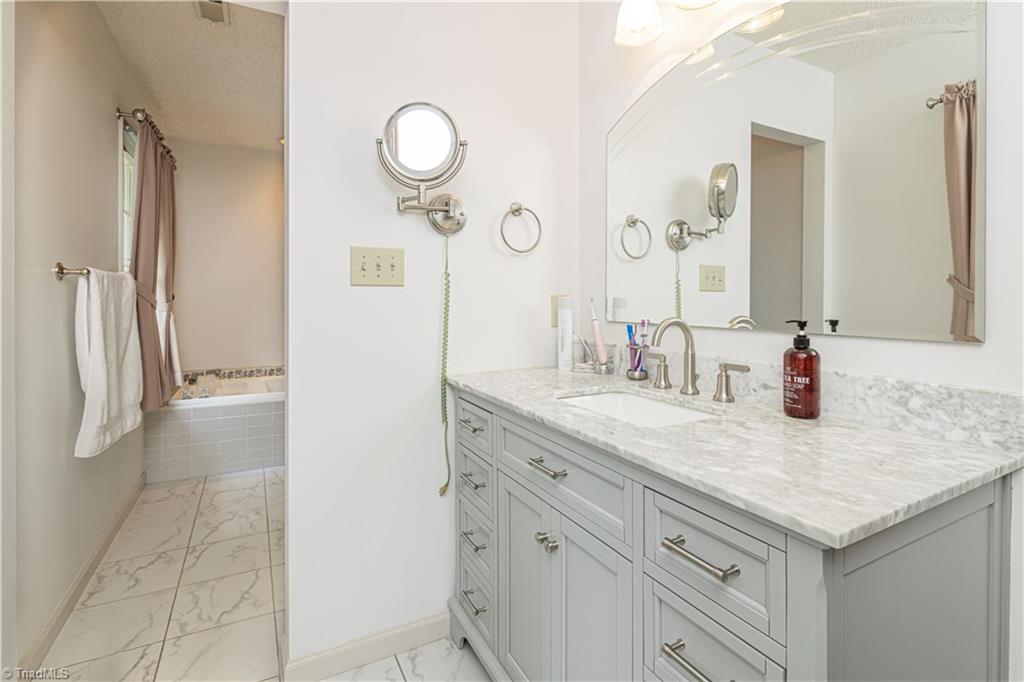1946 Winding Ridge Road Winston-Salem, NC 27127 - Photo 24 of 45 Remodeled Primary Bathroom