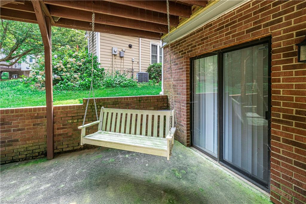 1946 Winding Ridge Road Winston-Salem, NC 27127 - Photo 39 of 45 Basement Walks Out to a Patio