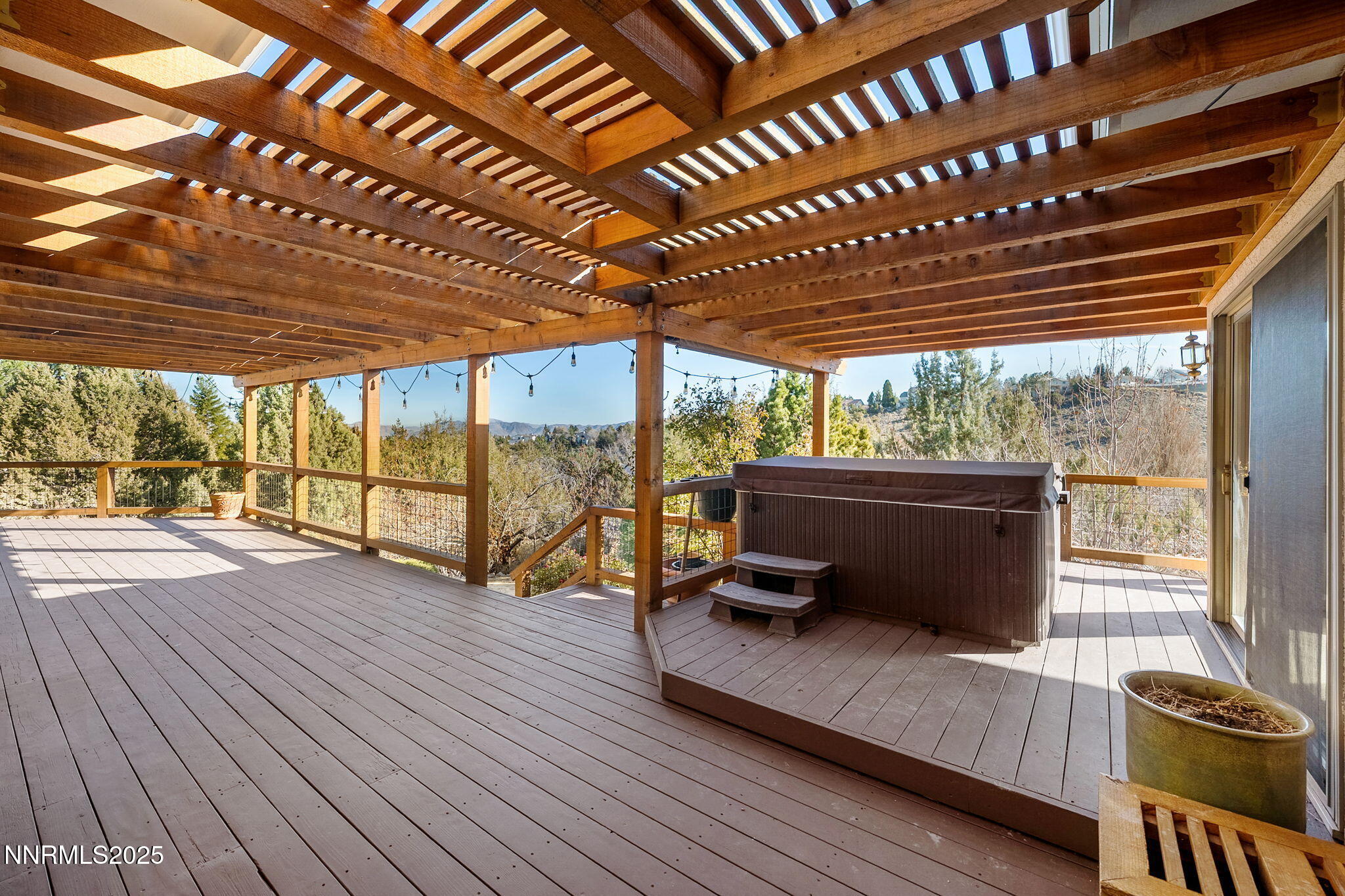 1205 Greensburg Circle Reno, NV 89509 - Photo 20 of 41 a roof deck with table and chairs