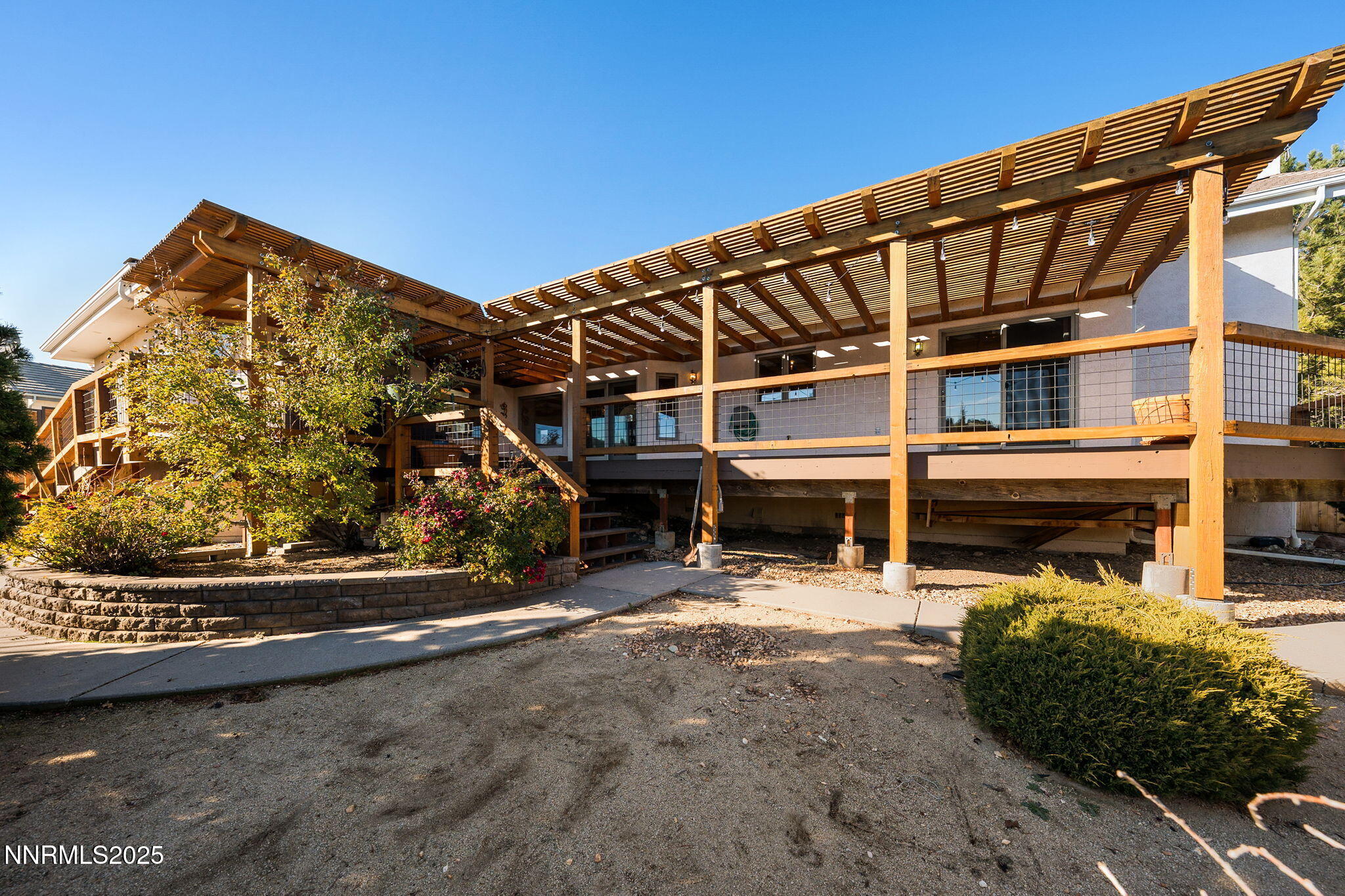 1205 Greensburg Circle Reno, NV 89509 - Photo 22 of 41 a view of a house with wooden fence