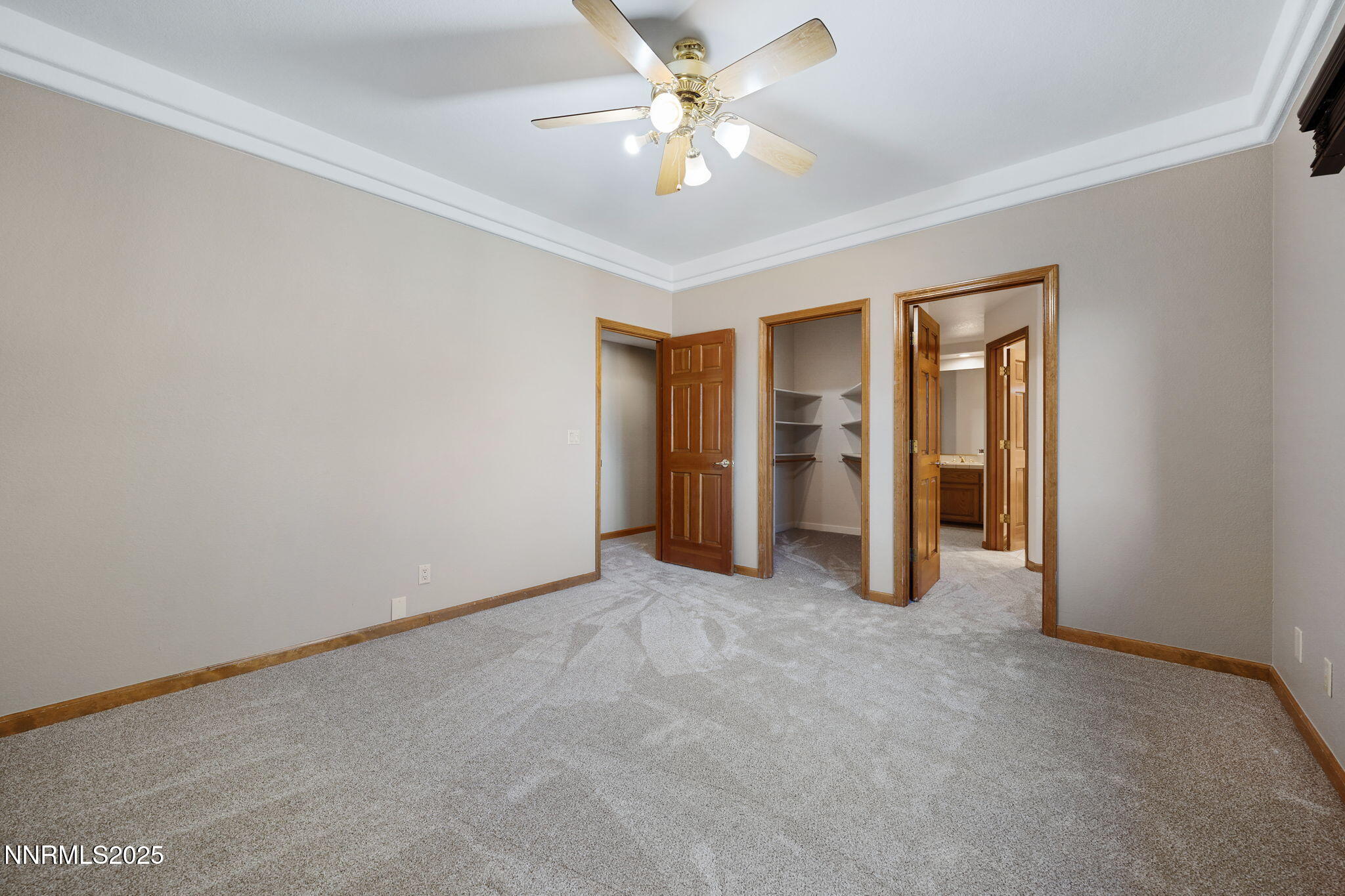 1205 Greensburg Circle Reno, NV 89509 - Photo 33 of 41 an empty room with closet and a ceiling fan