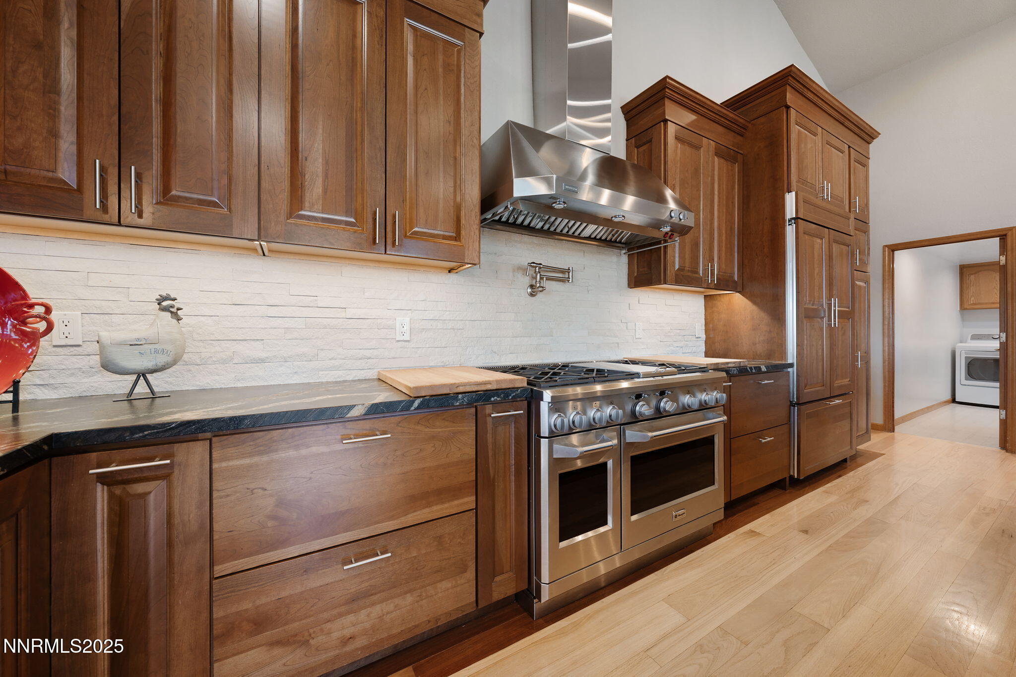 1205 Greensburg Circle Reno, NV 89509 - Photo 10 of 41 a kitchen with stainless steel appliances granite countertop a stove and a sink with cabinets