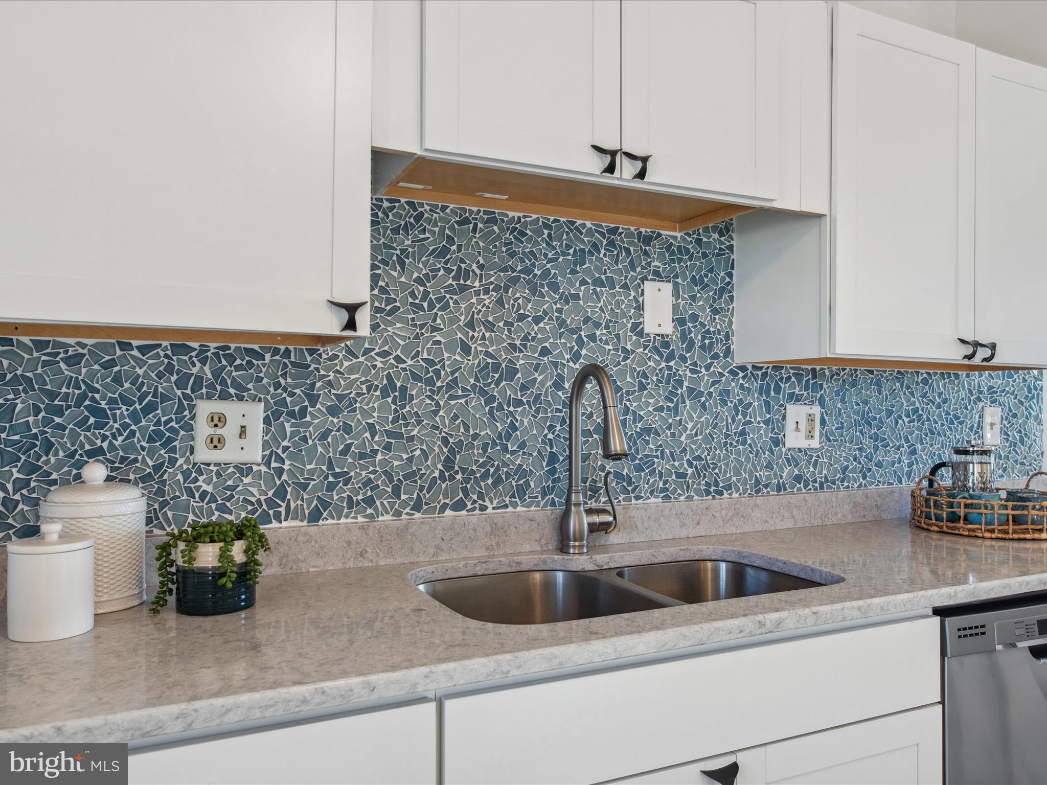 9207 Rusty Anchor Road, Unit A18 Ocean City, MD 21842 - Photo 12 of 50 Coastal Backsplash, Double Sink