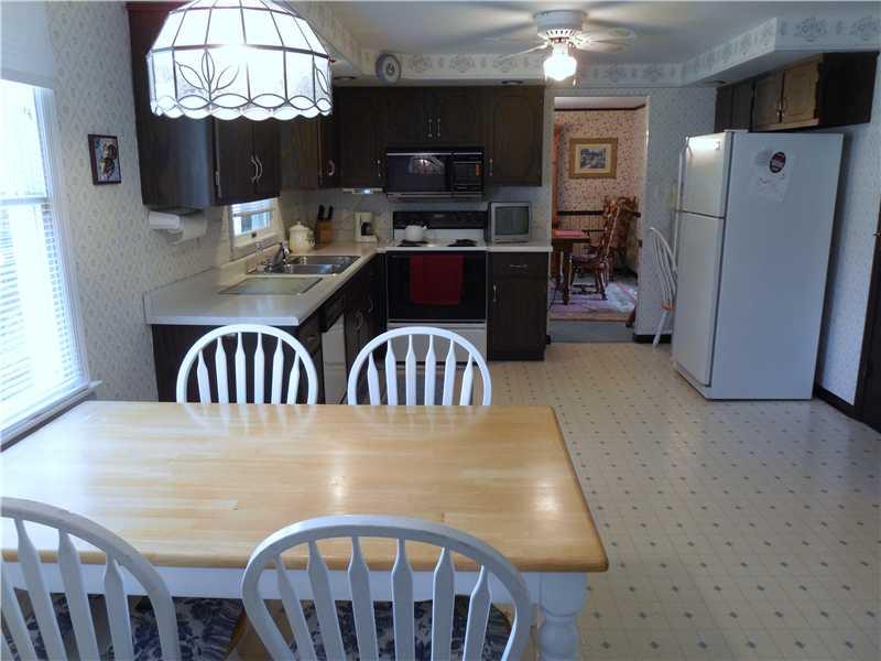 171 Spring Grove Road Penn Hills, PA 15235 - Photo 6 of 24 Kitchen. Huge eat in kitchen with pantry & built in desk