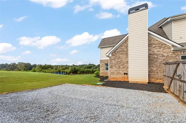 a view of a backyard and a yard