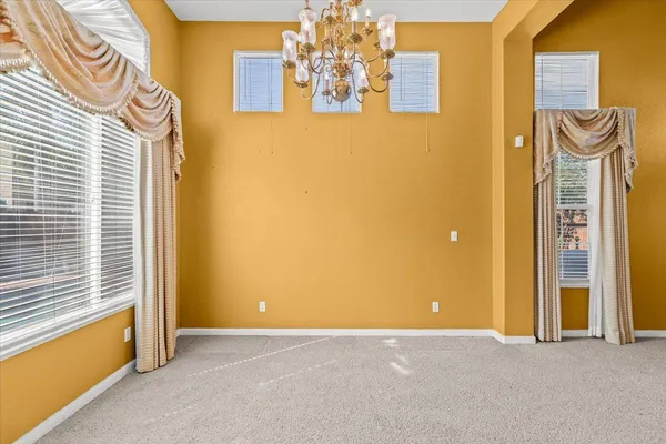 a kitchen with stainless steel appliances granite countertop a refrigerator a sink a stove a microwave and island