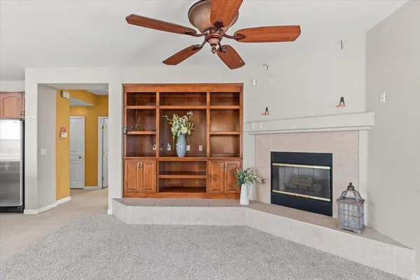 a view of entryway with wooden floor and door