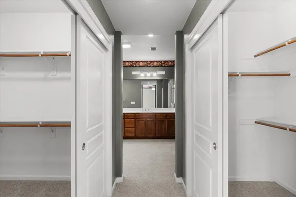 a view of a chairs and table on the balcony