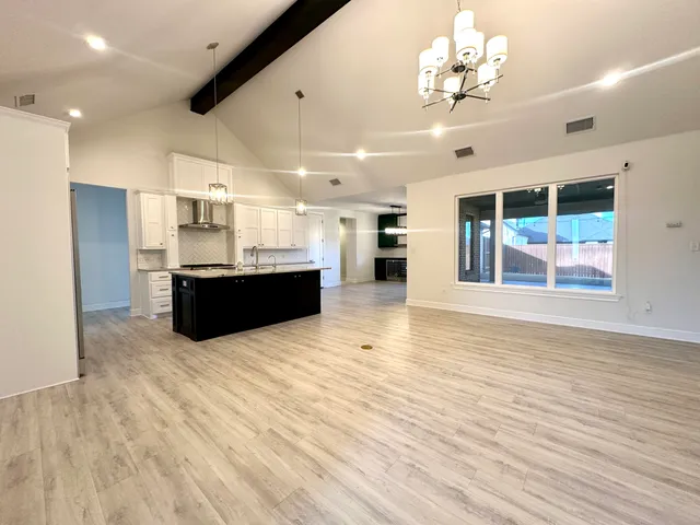 a view of kitchen and sink