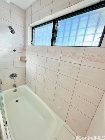 a bathroom with a bathtub