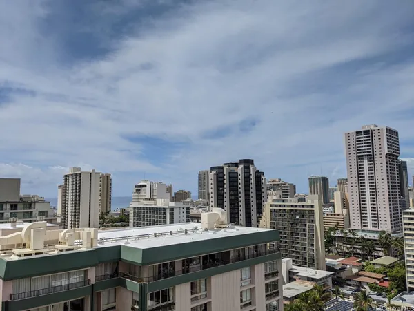 a view of a city with tall buildings