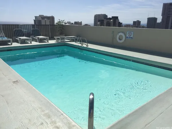 a view of swimming pool with a terrace