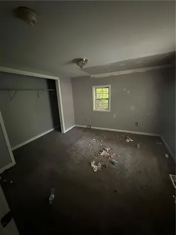 en empty room with windows