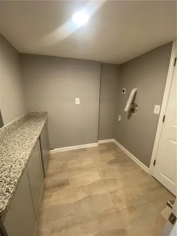 a bathroom with a toilet and a sink
