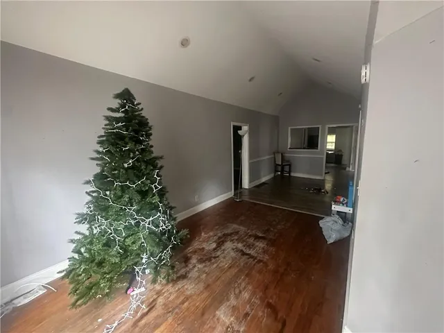 a view of entryway and hall with a trees