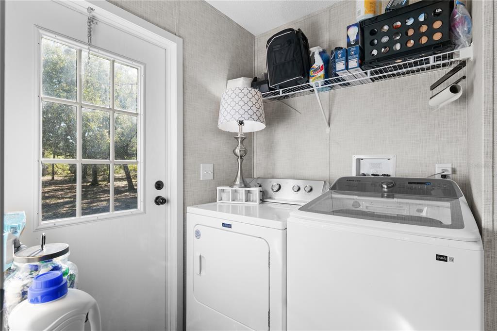 18625 Deason Drive Spring Hill, FL 34610 - Photo 28 of 35 a room with a sink and cabinets