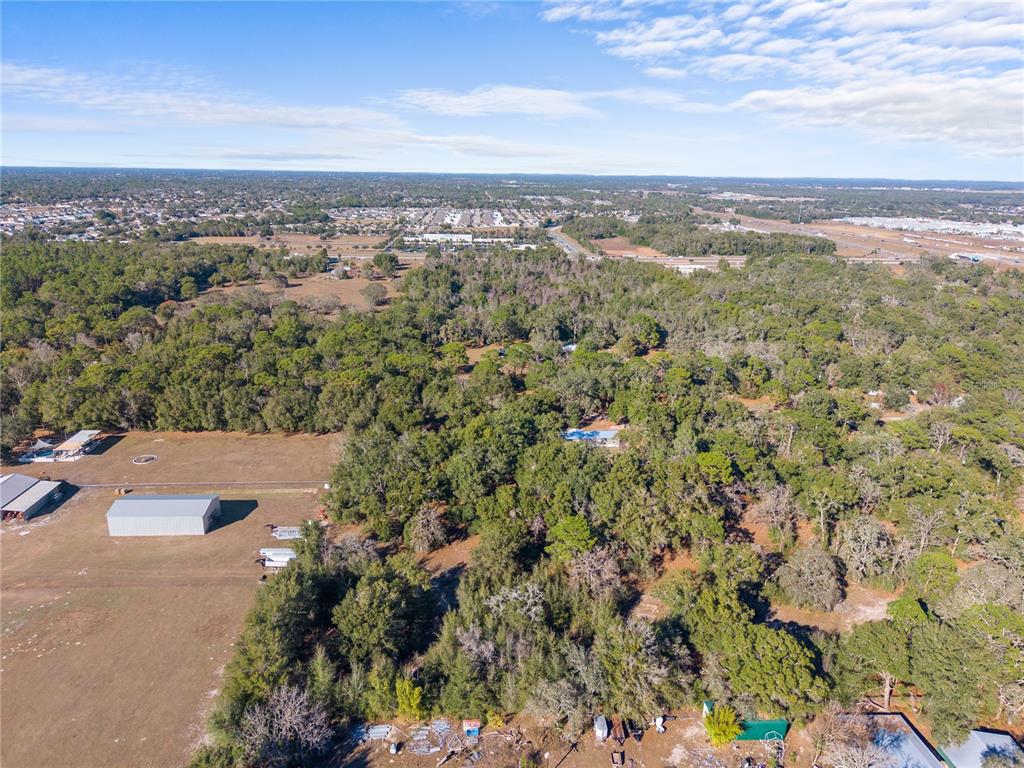 18625 Deason Drive Spring Hill, FL 34610 - Photo 33 of 35 an aerial view of a city
