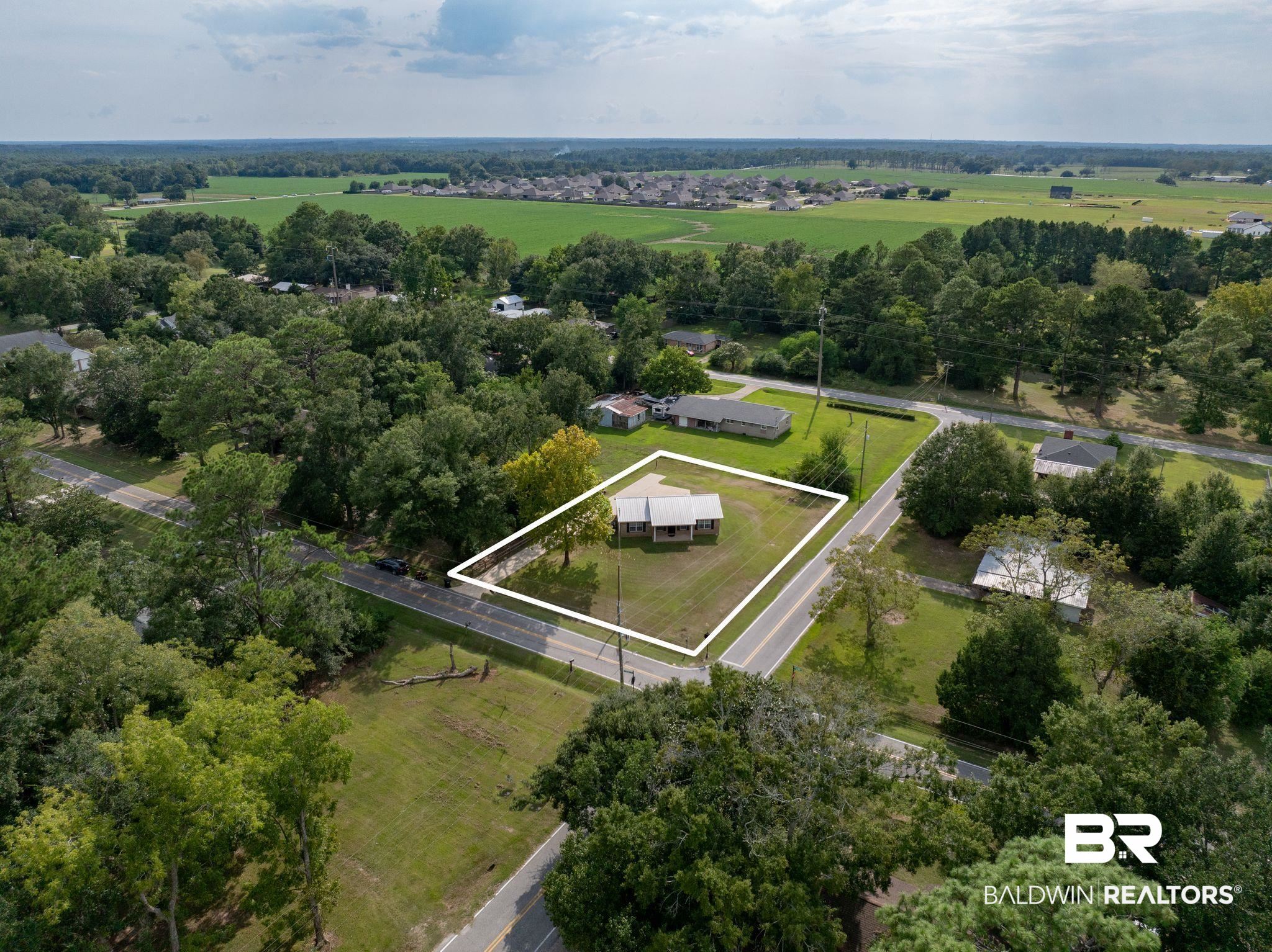 1107 North Oak Street Loxley, AL 36551 - Photo 26 of 40 Drone / aerial view featuring a rural view