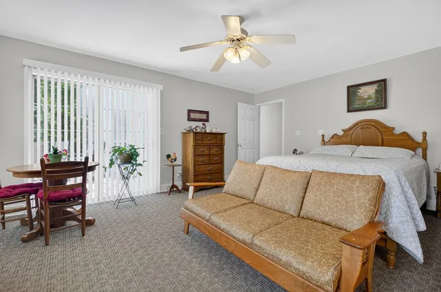 a work room with furniture and window