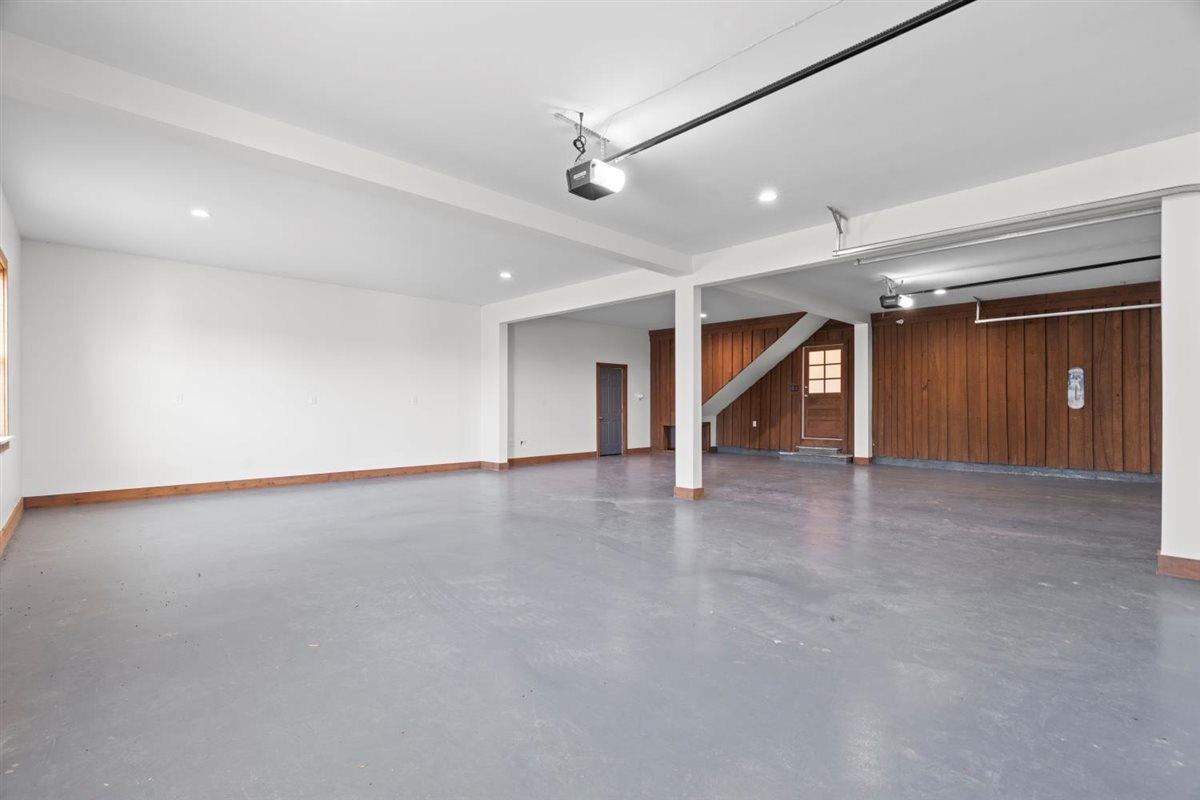 620 Diffee Road Moscow, TN 38057 - Photo 18 of 40 an empty room with staircase and white walls