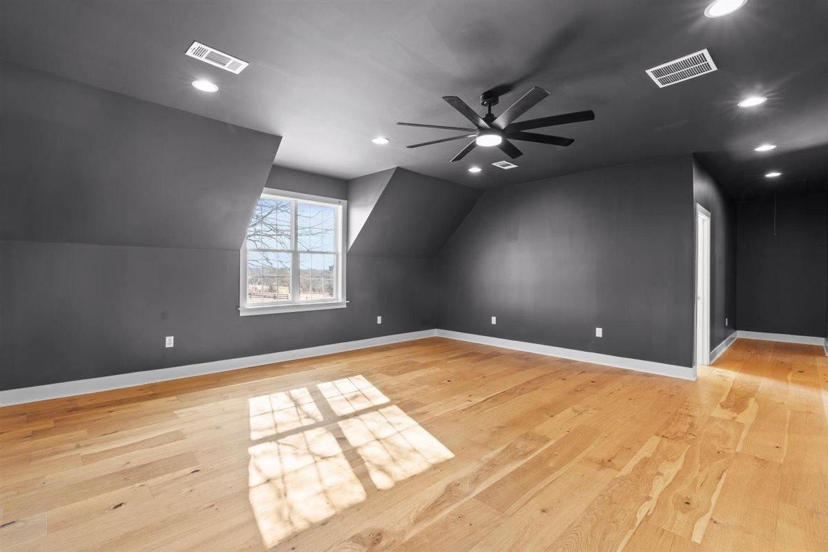 620 Diffee Road Moscow, TN 38057 - Photo 23 of 40 an empty room with windows and fan