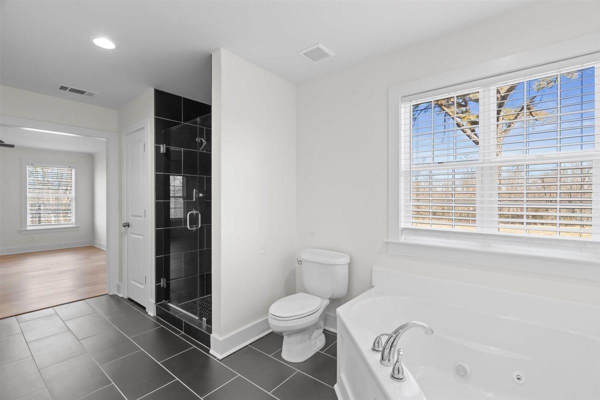 620 Diffee Road Moscow, TN 38057 - Photo 28 of 40 a bathroom with a toilet sink and shower