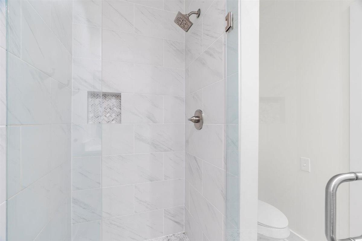 620 Diffee Road Moscow, TN 38057 - Photo 30 of 40 Bathroom featuring a stall shower and toilet