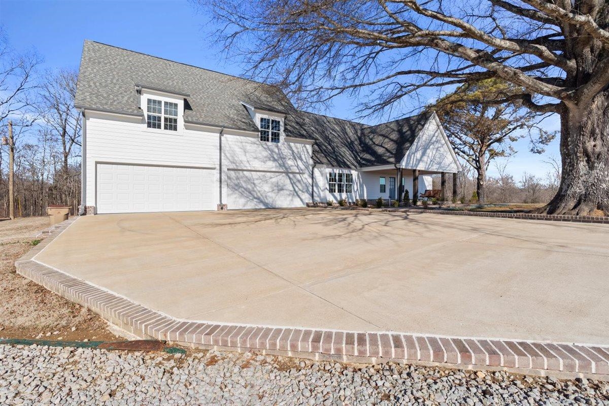 620 Diffee Road Moscow, TN 38057 - Photo 37 of 40 a view of a house with a snow