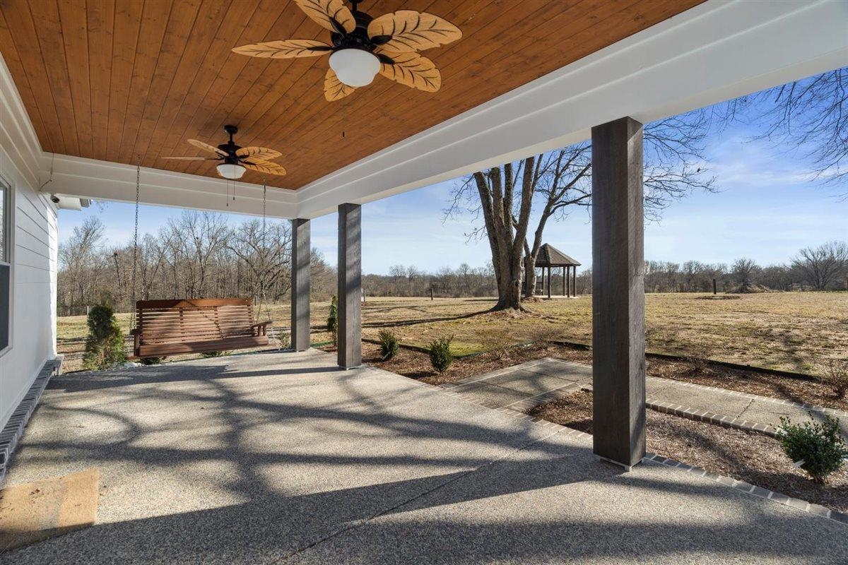 620 Diffee Road Moscow, TN 38057 - Photo 4 of 40 View of patio featuring ceiling fan