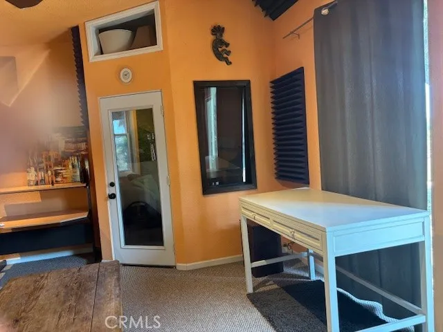 a room that has a bed and a window