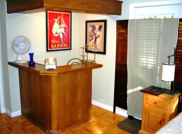 a front view of a house with many windows