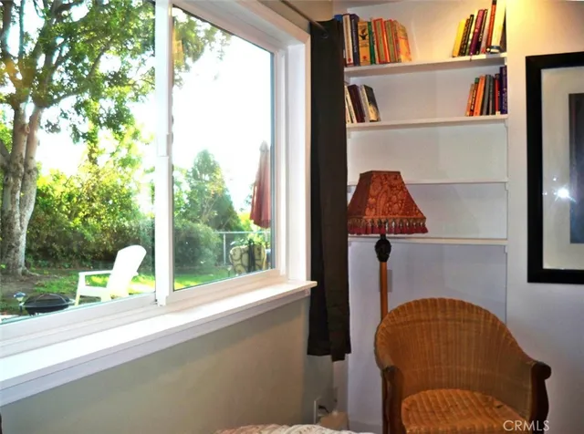 a view of entryway with a small kitchen