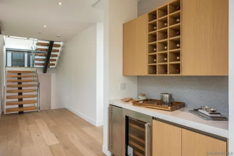 a kitchen with a sink and cabinets
