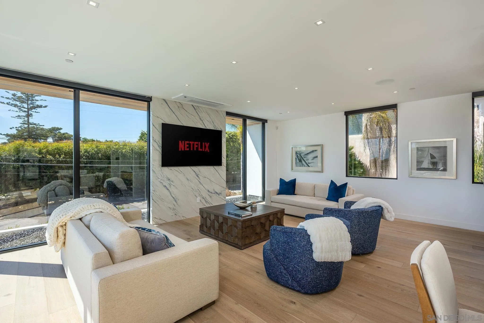 1605 Burgundy Road Encinitas, CA 92024 - Photo 18 of 49 a living room with furniture fireplace and a large window