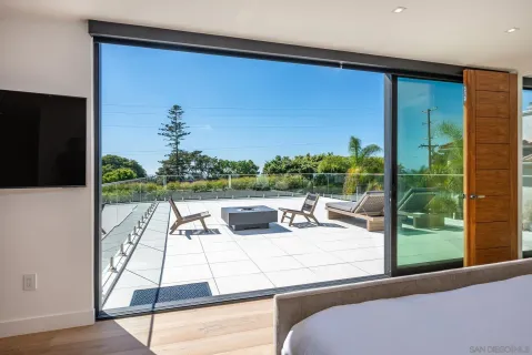 a living room with patio furniture