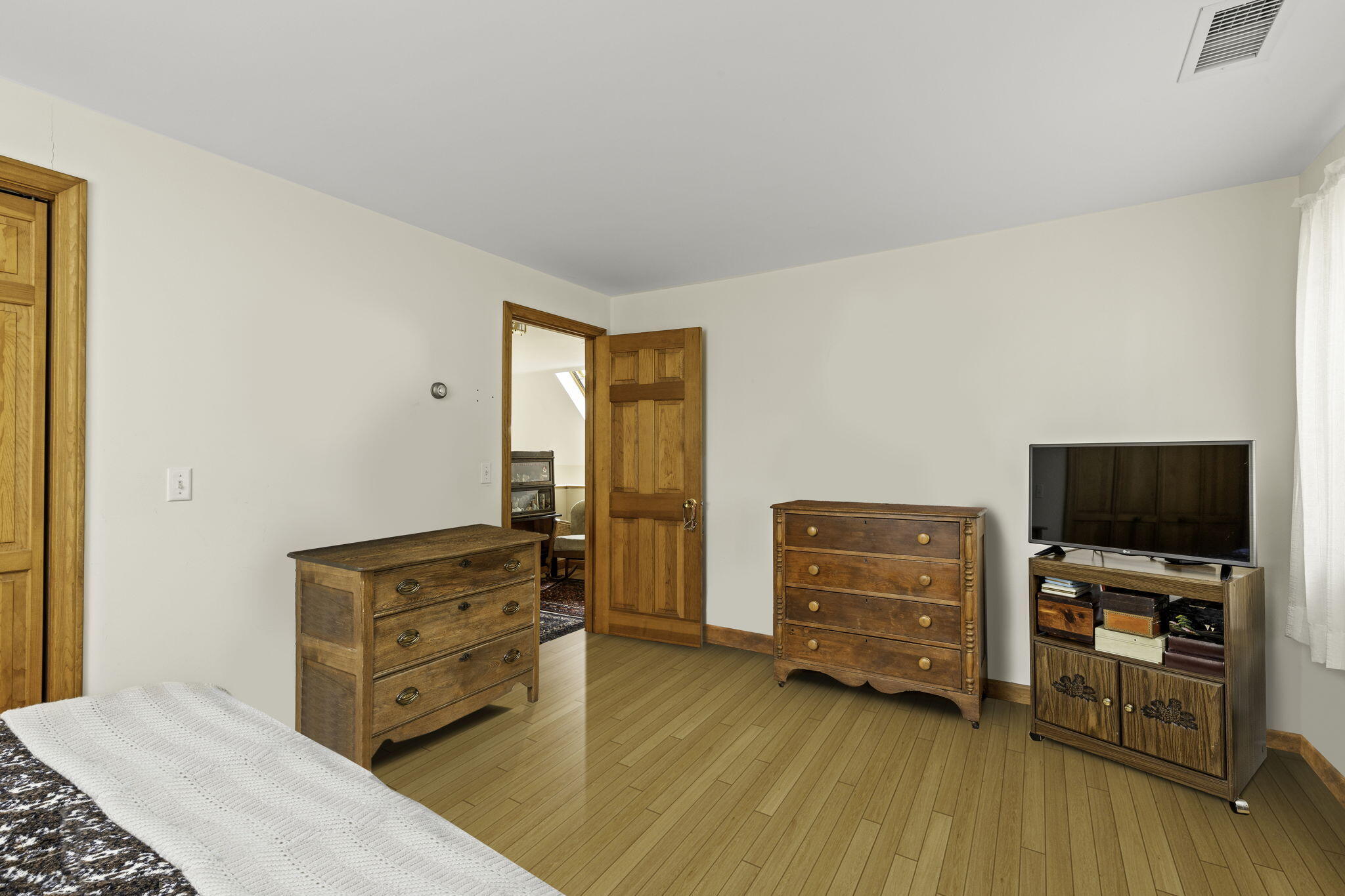 35 Pine Field Road Wellfleet, MA 02667 - Photo 21 of 31 a living room with furniture and a flat screen tv