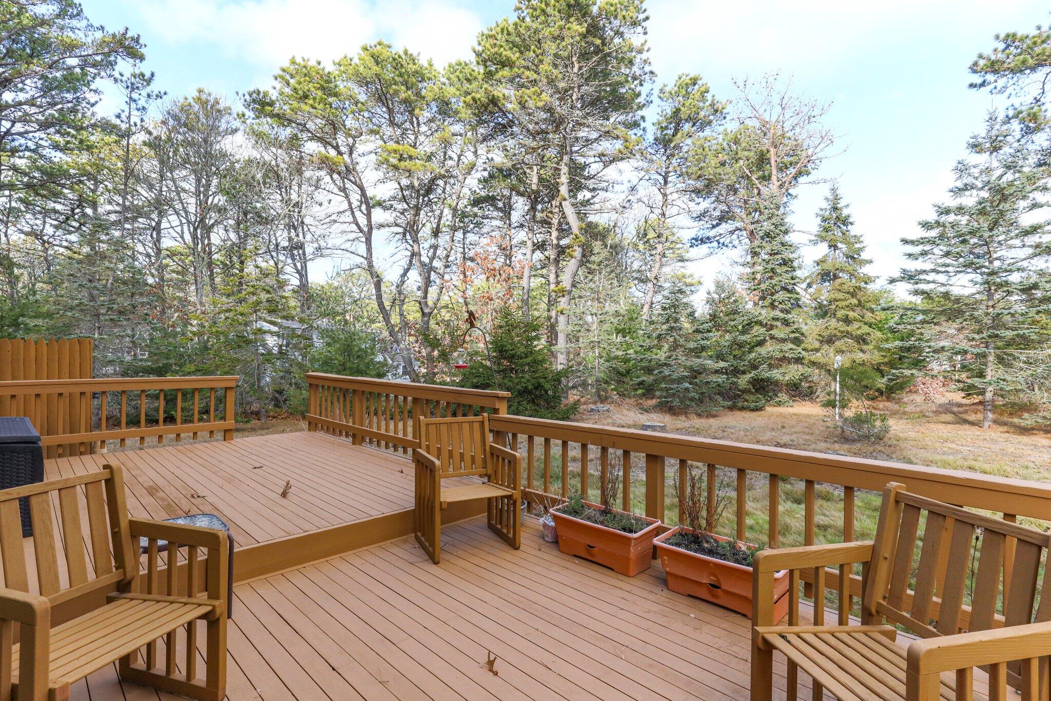 35 Pine Field Road Wellfleet, MA 02667 - Photo 27 of 31 a view of balcony with wooden floor and barbeque oven