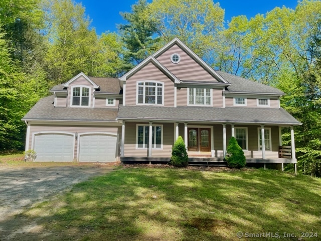 455 West Morris Road Morris, CT 06763 - Photo 1 of 1 a front view of a house with a garden
