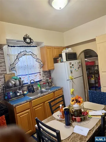 a room with furniture and air hockey table