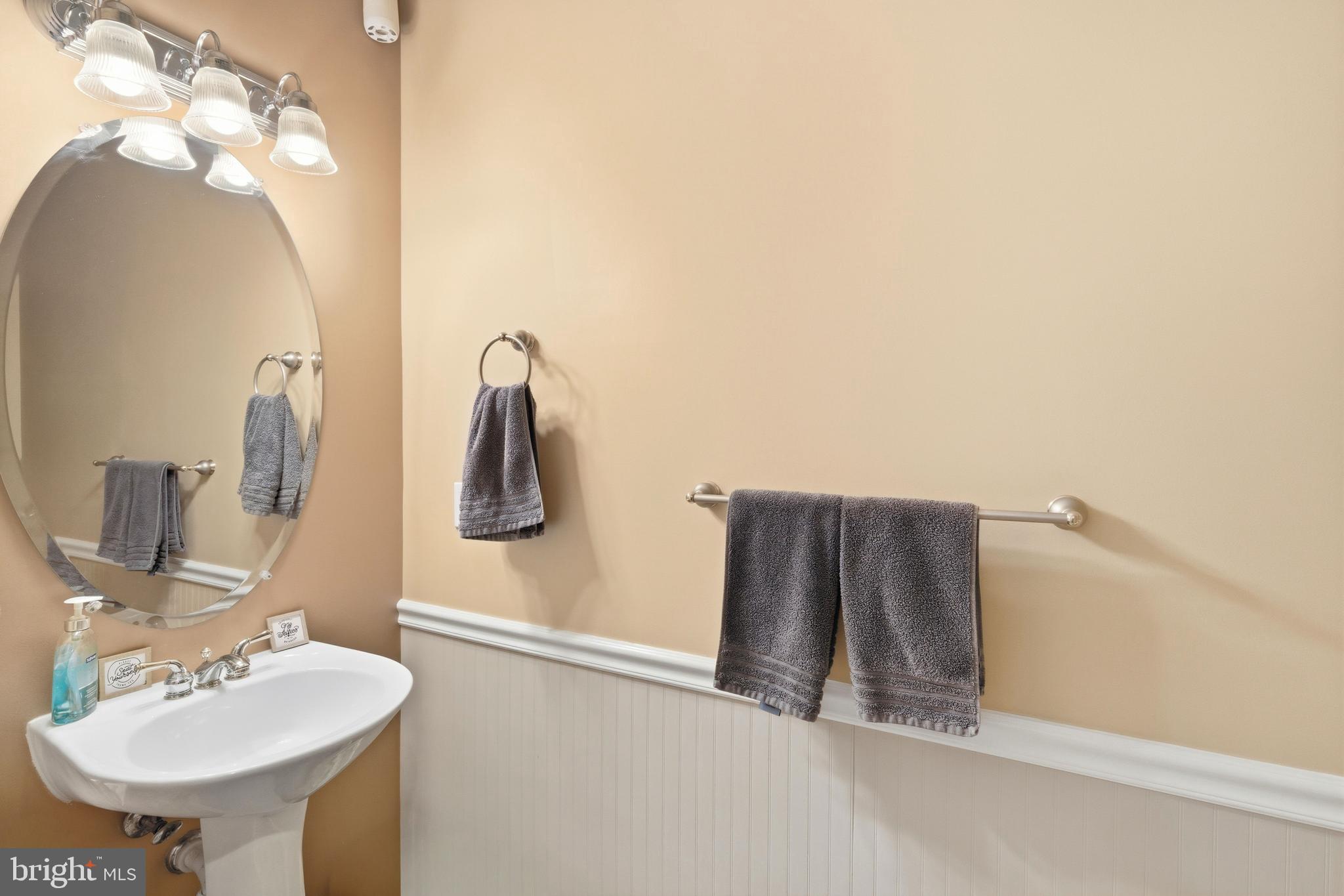 39 Rodeo Drive West Creek, NJ 08092 - Photo 29 of 78 a bathroom with a sink and mirror