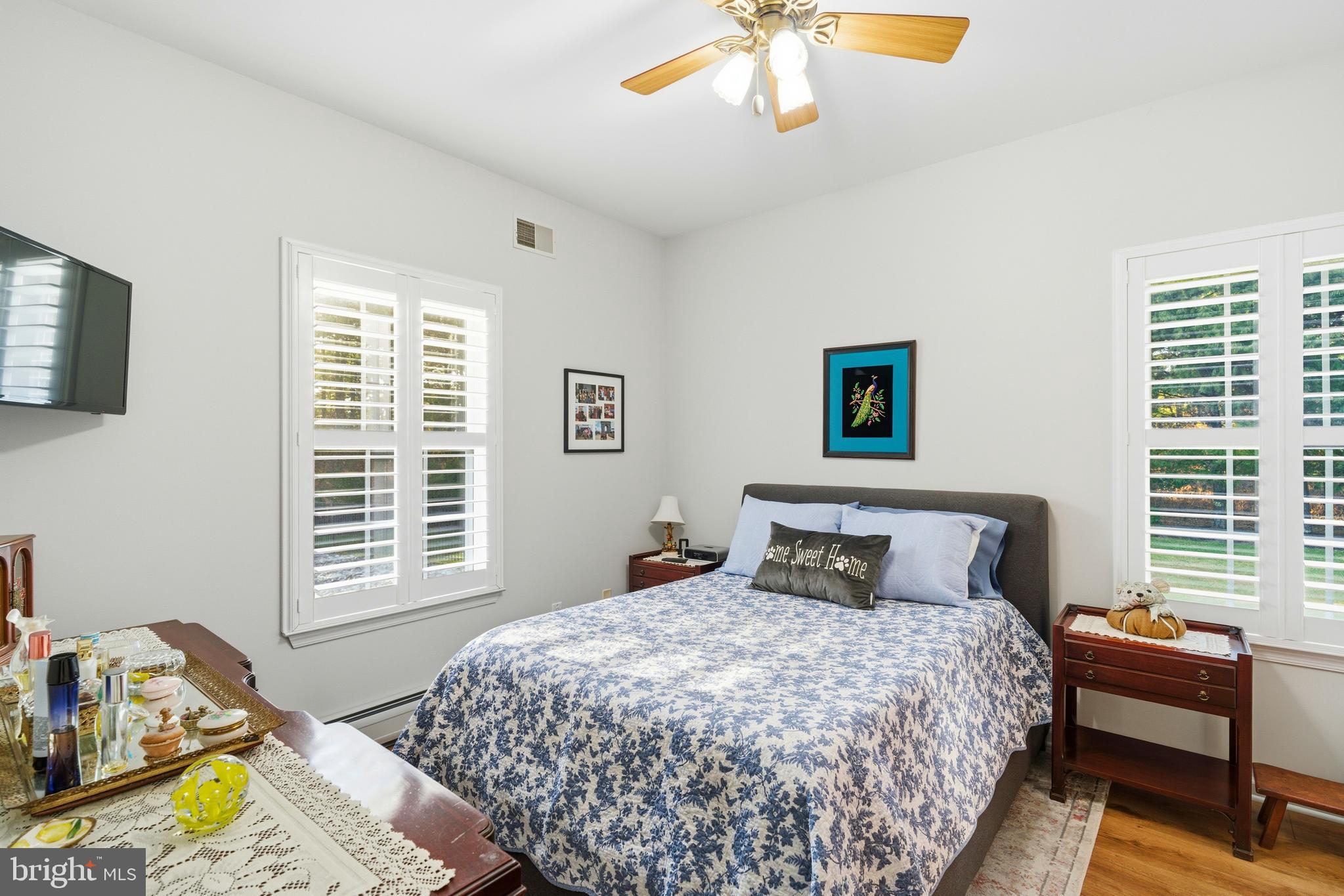 39 Rodeo Drive West Creek, NJ 08092 - Photo 42 of 78 a bedroom with a bed and wooden floor